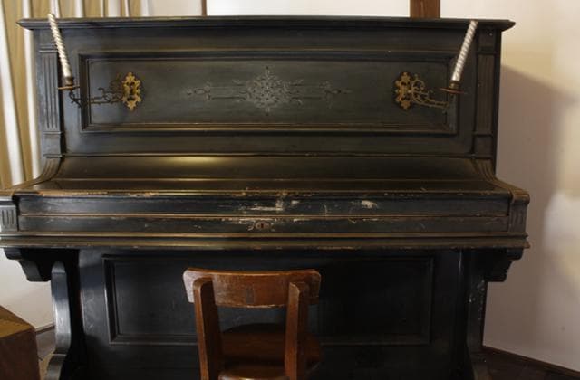 Piano with candlestick