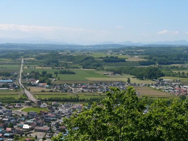 Honbetsu City and Daisetsu Mountains seen from the observation deck