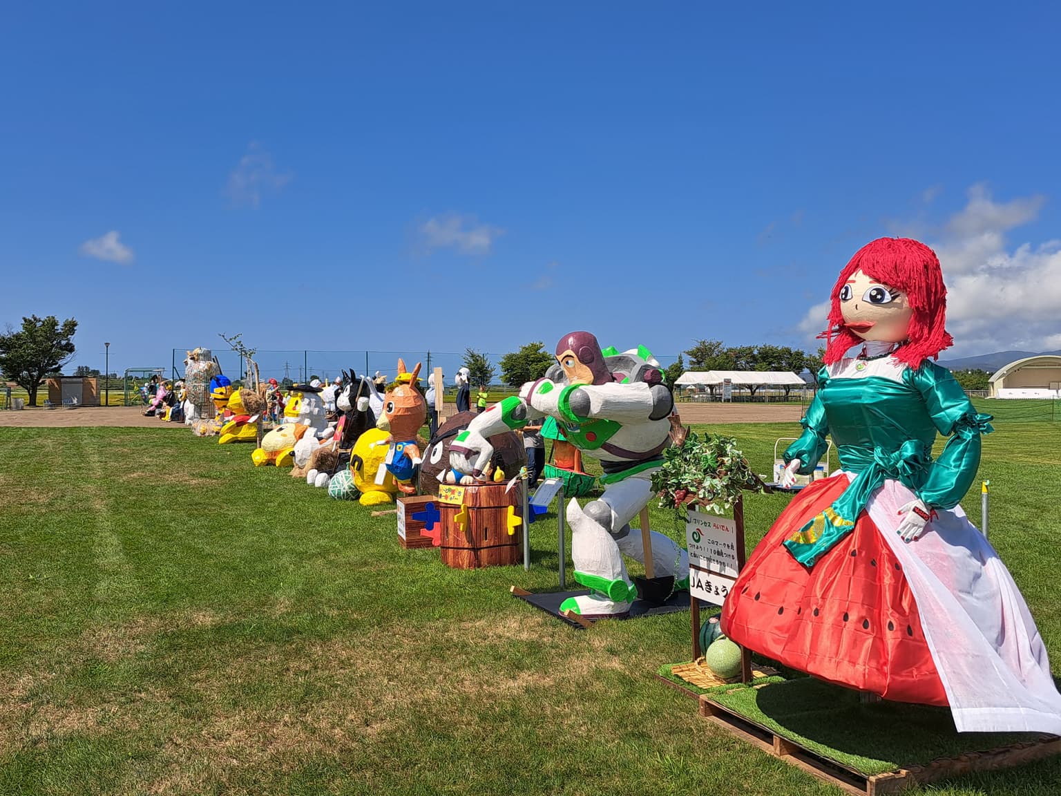 More than 100 unique scarecrows created by participants lined up at the venue