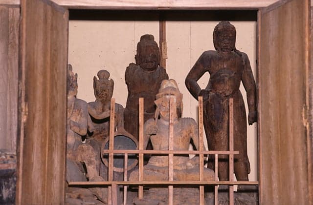 Standing wooden statue of Fudo Myo