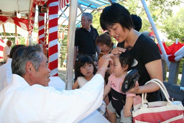 Children who receive a red mark on their forehead