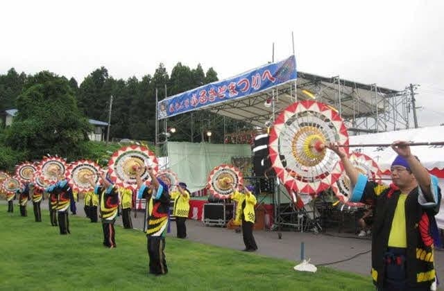 An umbrella dance by a local group