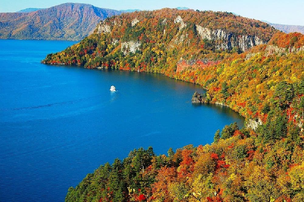 Autumn leaves along the Lake Towada and Towada Odate Jukai Line